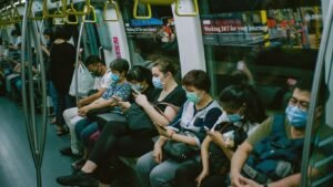 people sitting on train seat
