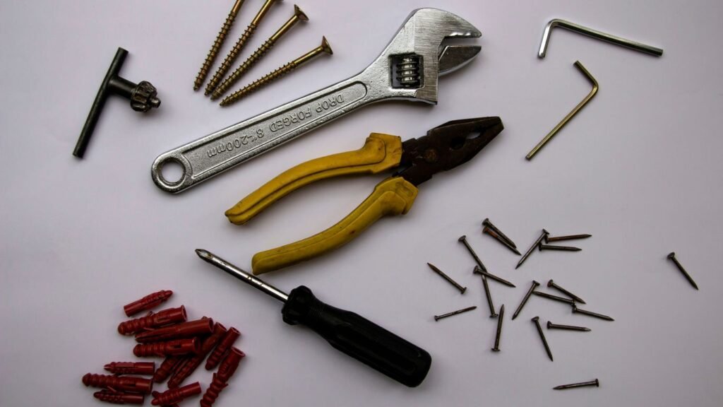 red and yellow handle pliers