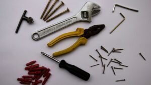 red and yellow handle pliers