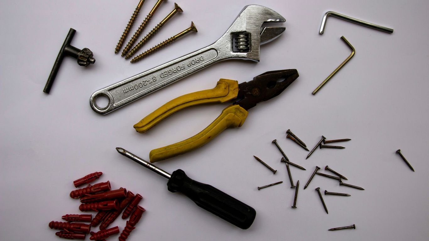 red and yellow handle pliers