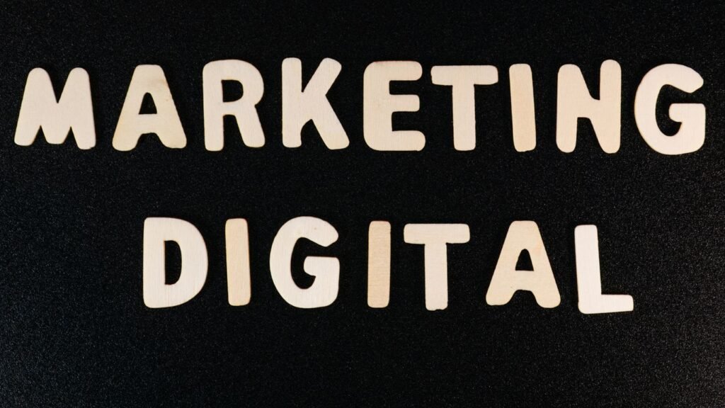 the words marketing and digital written on a black surface
