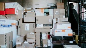 brown cardboard boxes on black plastic crate