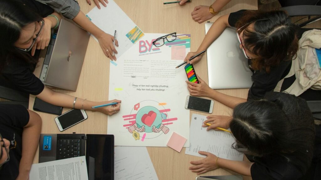 people having meeting beside table