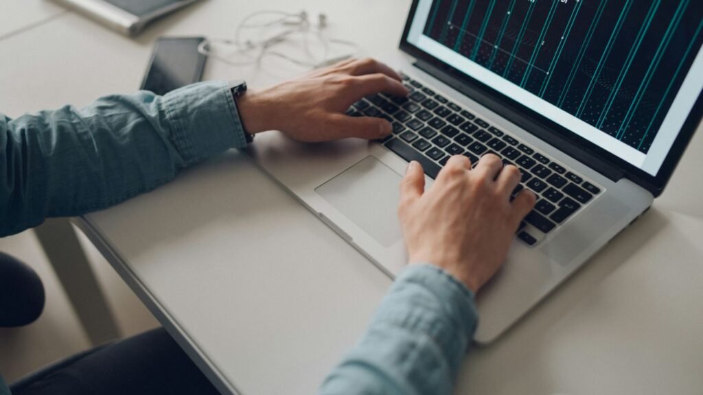 person using Macbook Pro