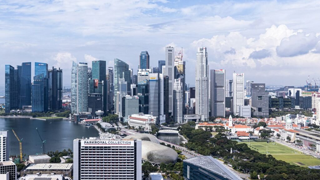 city buildings near body of water during daytime