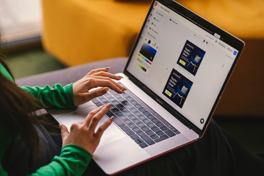 Singapore business owner setting up her first Google Ads campaign on a laptop