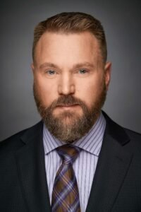 Professional portrait of a man in a suit and tie, the result of a well-prepared corporate photography session in Singapore