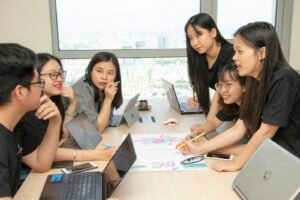 Advertising agency team discussing a project around a table