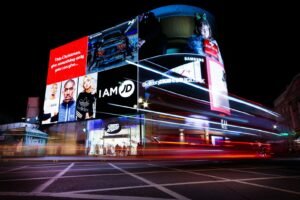 Illuminated advertising billboards at night