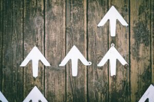 Arrows pointing upward, representing performance advertising