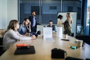 Team reviewing SEO agency results in a meeting room presentation