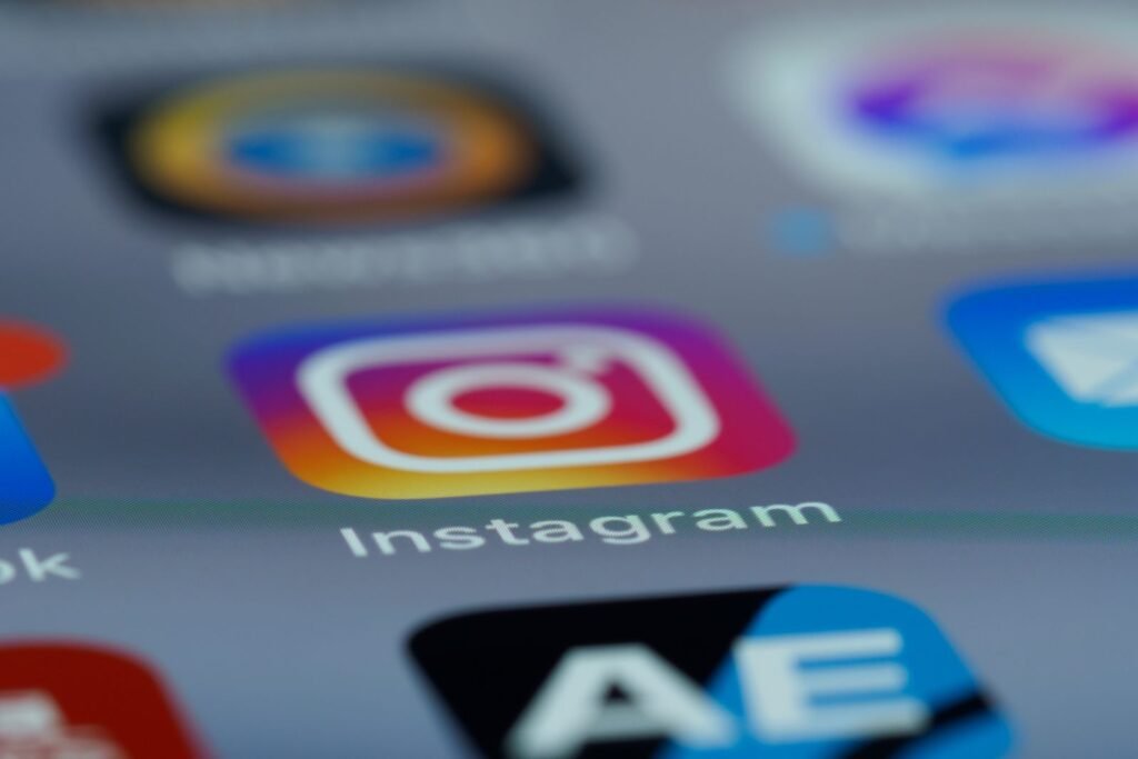 A user checking the Instagram app on a smartphone, illustrating the best time to post on Instagram in Singapore.