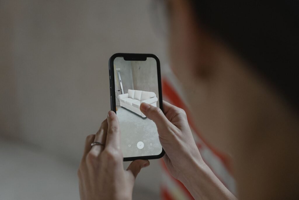 A person using a phone camera with an augmented reality effect, as used in branded AR filters in Singapore.