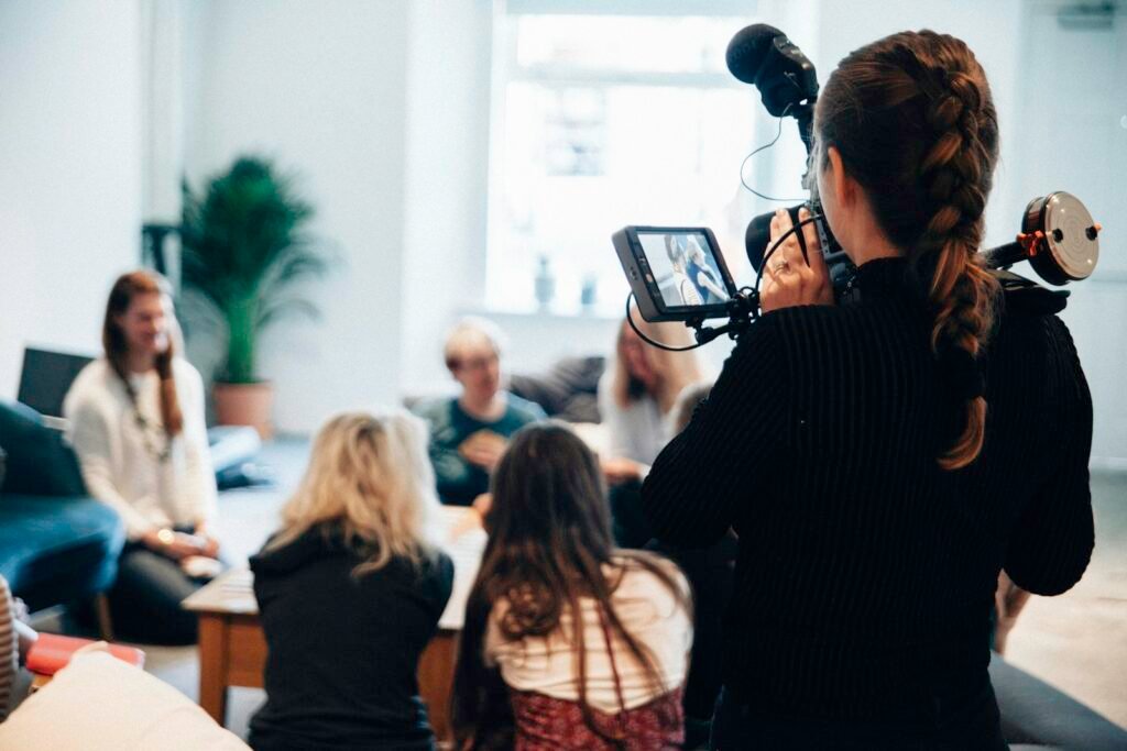 Camera operator filming a corporate video
