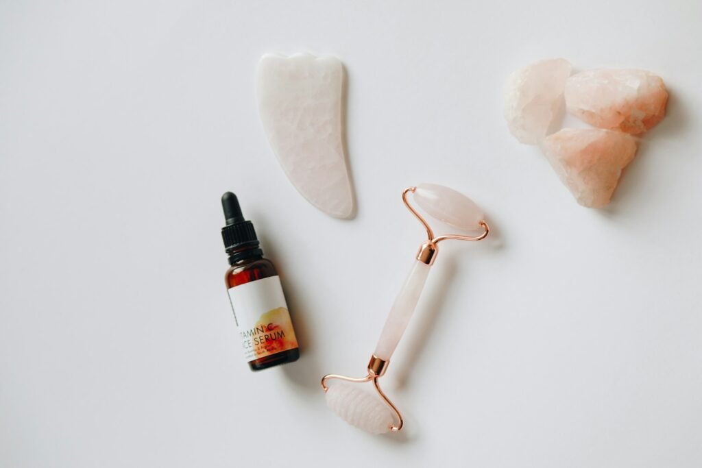 Skincare serum and facial roller, representing digital marketing for beauty brands