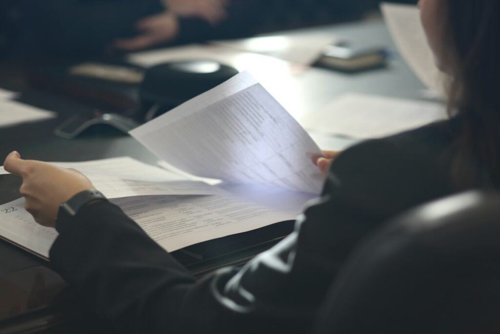 Lawyer reviewing legal documents, representing digital marketing for law firms