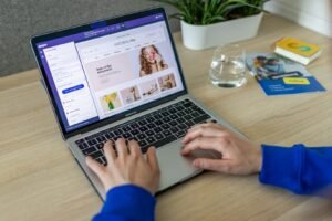 Designer working on an ecommerce store website on a laptop