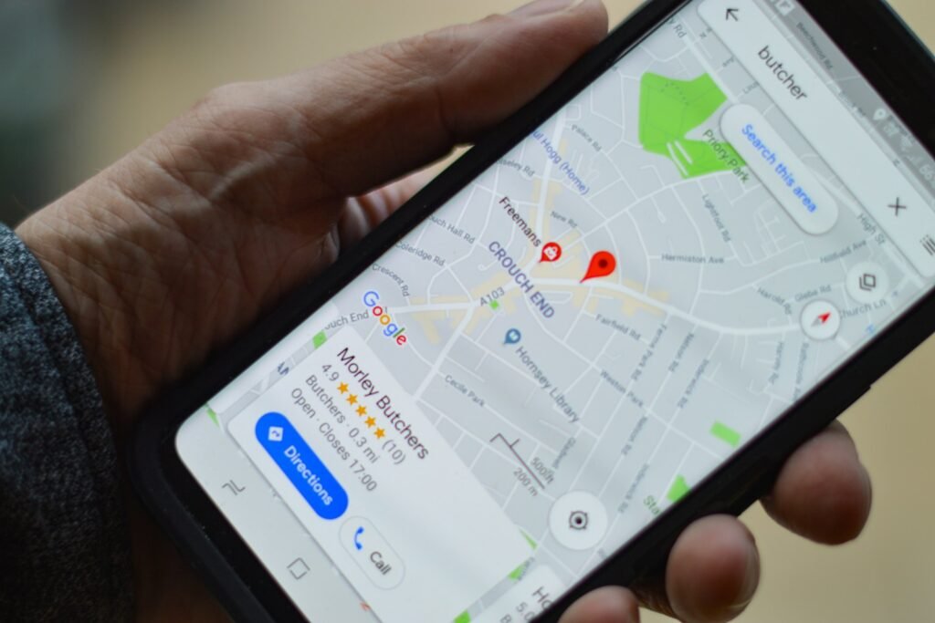 Map app with a location pin on a phone, representing Google Business Profile optimisation