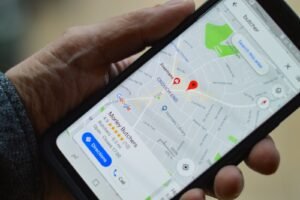 Map app with a location pin on a phone, representing Google Business Profile optimisation