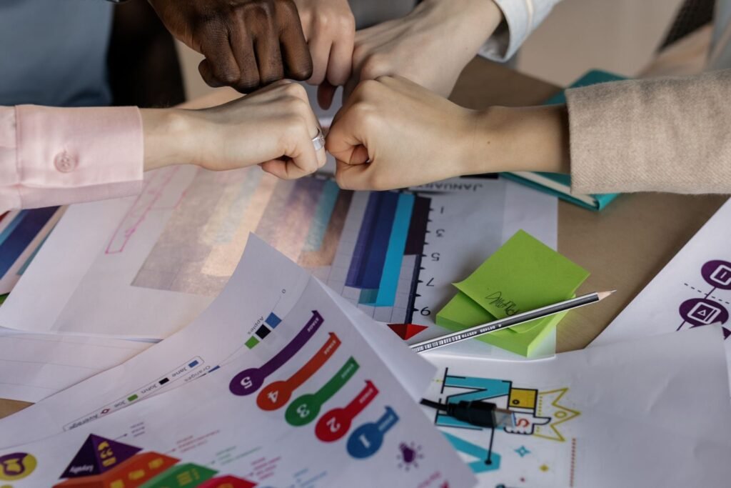 A performance dashboard and a video edit timeline side by side as a marketing video production company reviews campaign results.