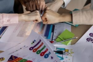 A performance dashboard and a video edit timeline side by side as a marketing video production company reviews campaign results.