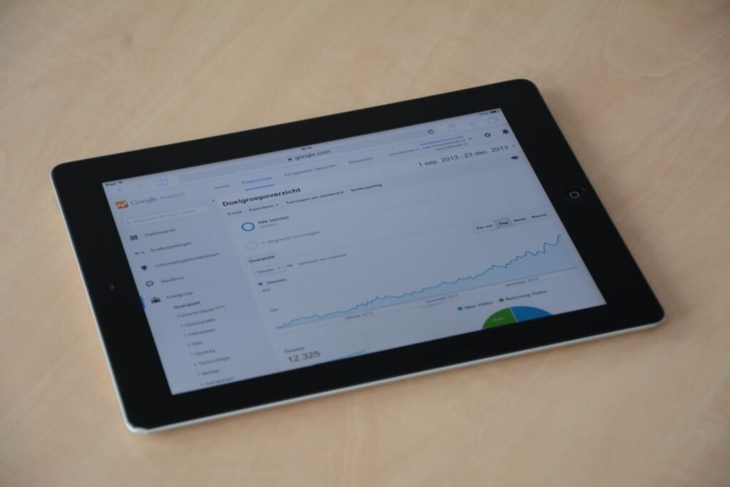 A marketer reviewing page and account analytics on screen inside Meta Business Suite in Singapore.