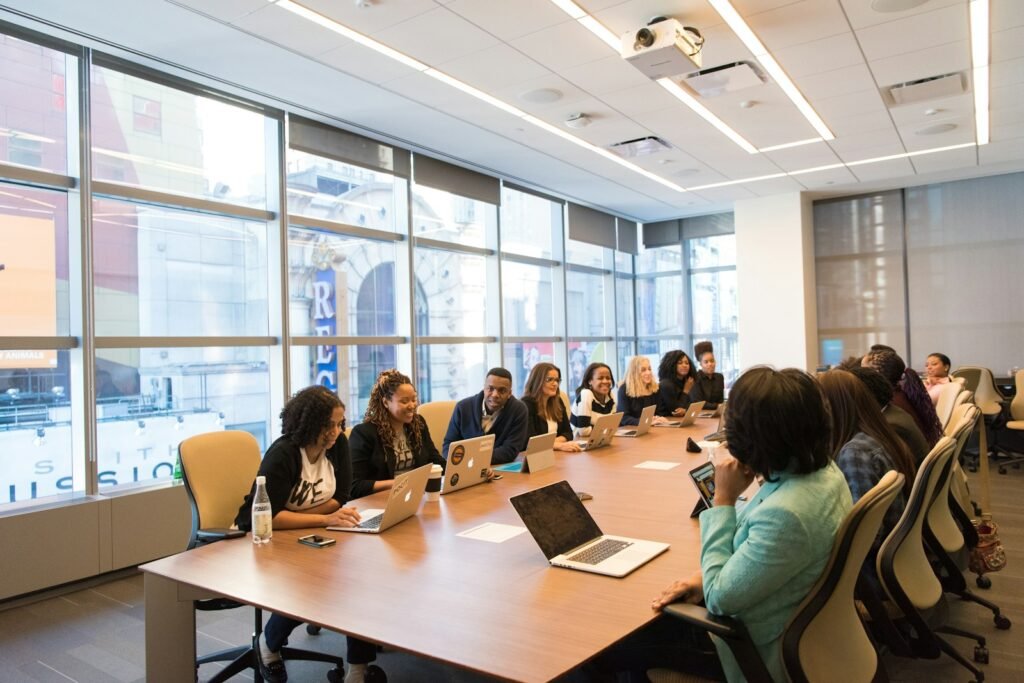 Team reviewing results in a conference room, representing SEM case studies