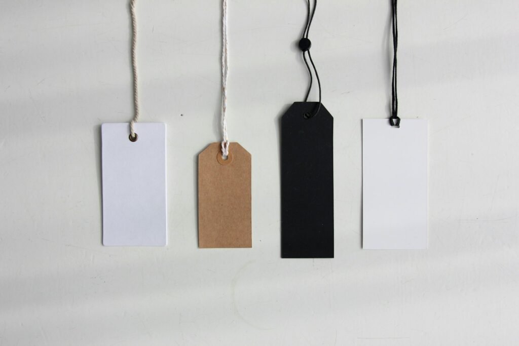 Blank price tags hanging in a row, representing SEO agency pricing
