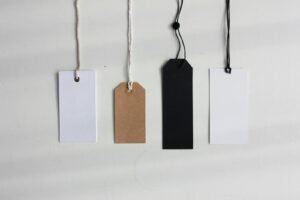 Blank price tags hanging in a row, representing SEO agency pricing