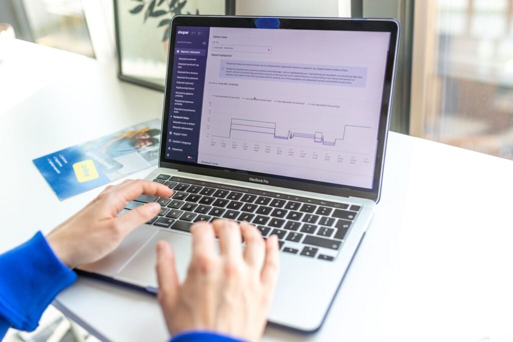 Singapore e-commerce marketer reviewing Shopify SEO data, product pages, and search rankings on a desktop monitor.
