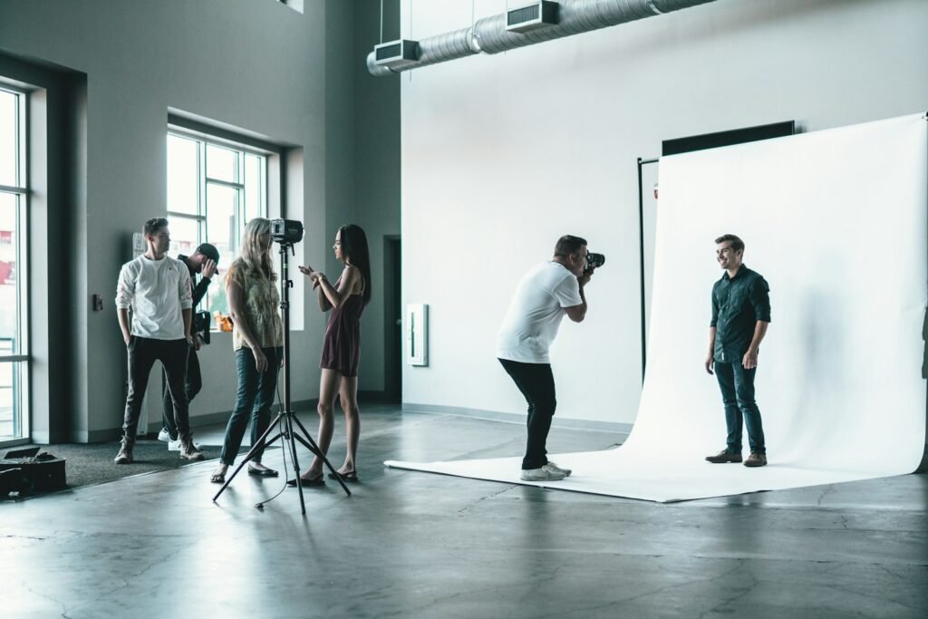 Creative team on a photo shoot, representing a creative social media agency
