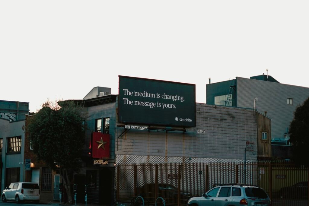 Roadside billboard advertisement, representing paid advertising for business growth