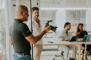 Photographer capturing a speaker and attendees at a corporate event in Singapore.